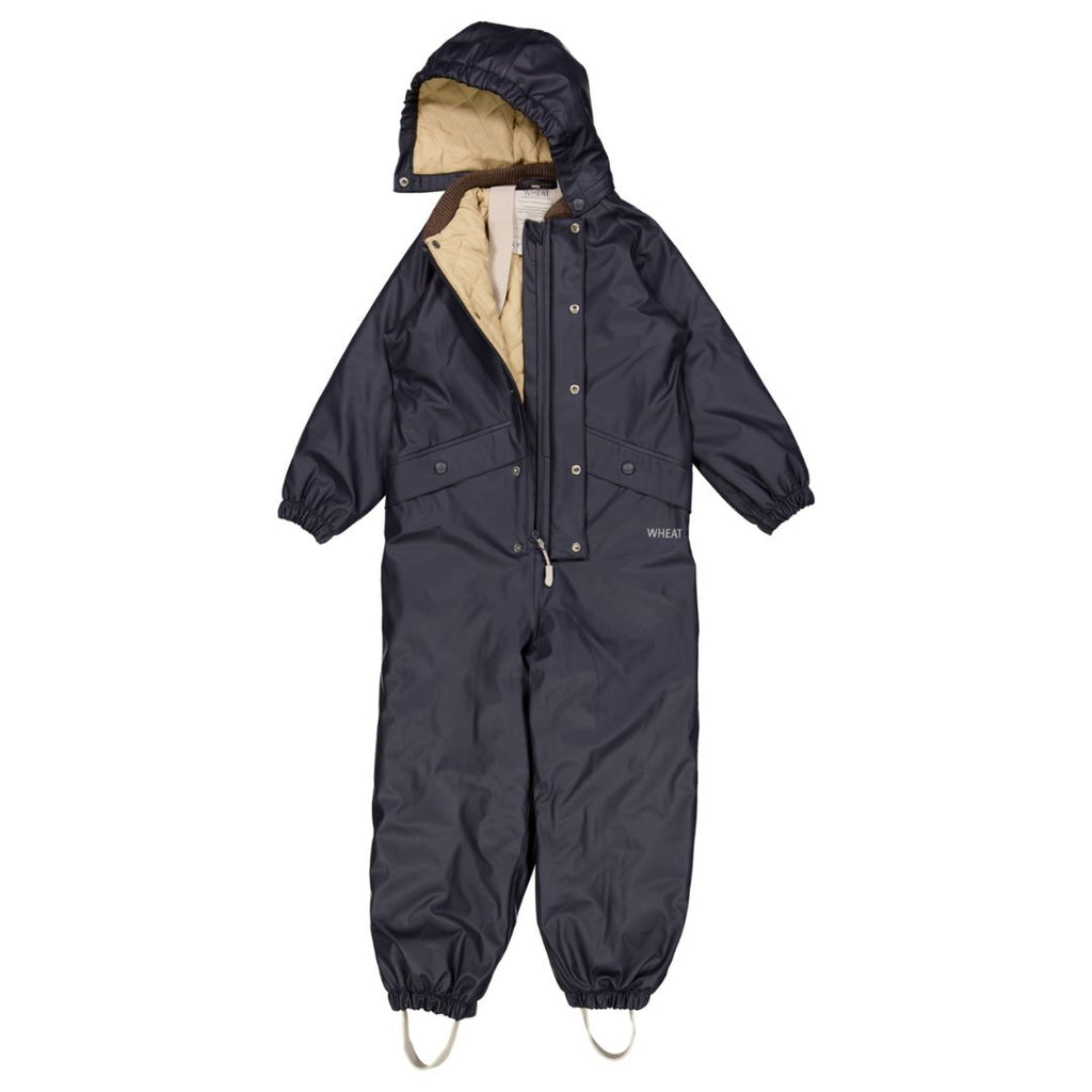 Wheat thermo regenkleding warm pak om kind buiten te laten spelen in regen en nattigheid duurzaam van gerecyclede materialen oekotex 100 warm pak onesie met bretels  en afneembare capuchon zo blijft je kind droog en warm zoals een ielm pak maar wel waterdicht en warm